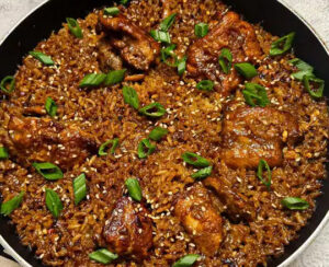 Braised Rice with Fried Chicken, Fish, Tomato Gravy and Coleslaw