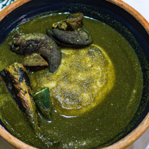 Fufu with Ebunebunu-Green Soup (Snail, Dried Fish, Herrings)