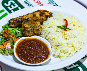 Plain Rice with Chicken, Fish, Tomato Gravy and Coleslaw
